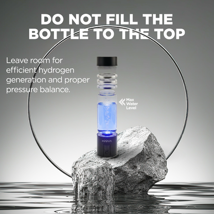 Hydrogen Water Bottle with blue liquid on a rock, surrounded by water, with text advising not to fill the bottle to the top.